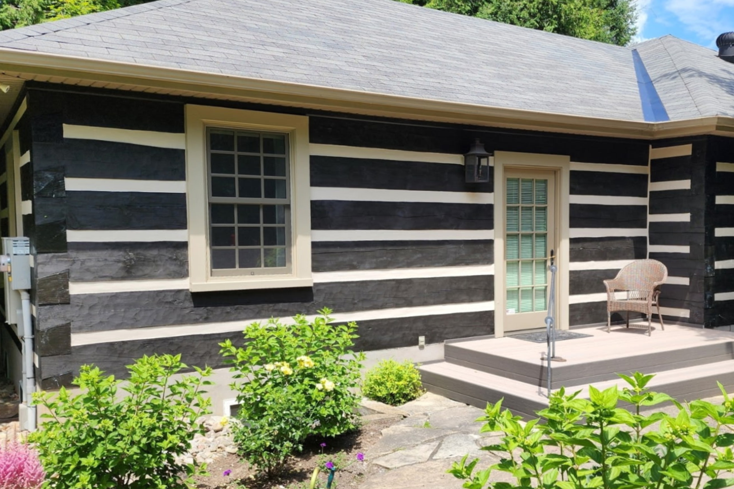 Professional chinking applied to log home in Haliburton, Ontario