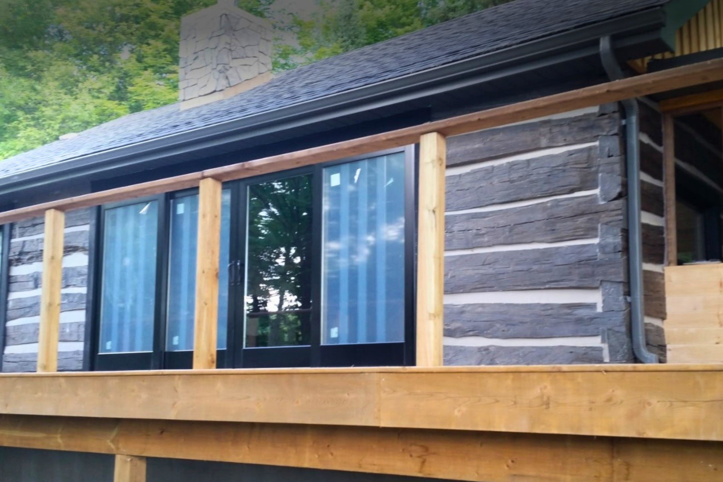 Refinished log cabin with fresh sealant applied in Ontario, Canada