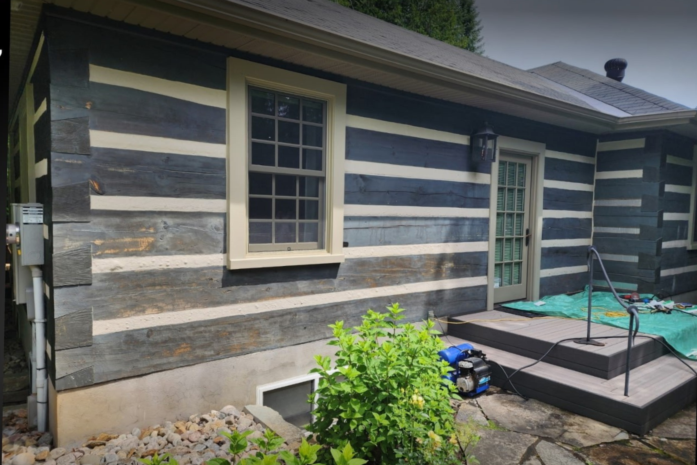 Before and after photo of log home restoration in Muskoka